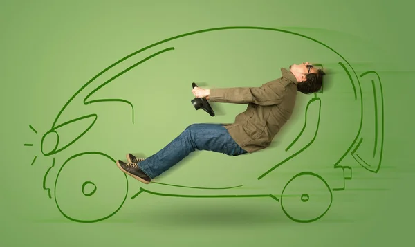 Человек ведет экологическую friendy электрическую руку оттянутым автомобилем — стоковое фото