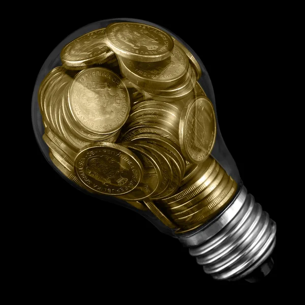 Лампа с монетами — стоковое фото